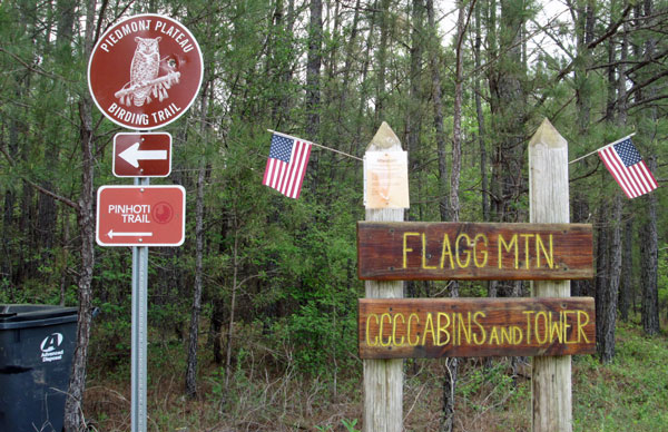 Signage at dirt CC Camp Road and paved Lay Dam Road 55