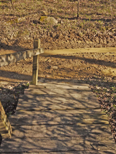 Muddy road just south of the bridge.